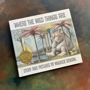 Where The Wild Things Are written and illustrated by Maurice Sendak-50th anniversary edition-2013-caldecott award-winning picture book-view of the dust jacket's front cover