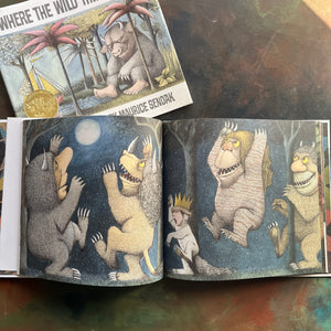 Where The Wild Things Are written and illustrated by Maurice Sendak-50th anniversary edition-2013-caldecott award-winning picture book-view of the monsters and Max howling at the full moon