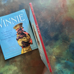 Winnie written by Sally M. Walker with illustrations by Jonahan D. Voss-The True Story of the Bear Who Inspired Winnie-The-Pooh-view of the spine