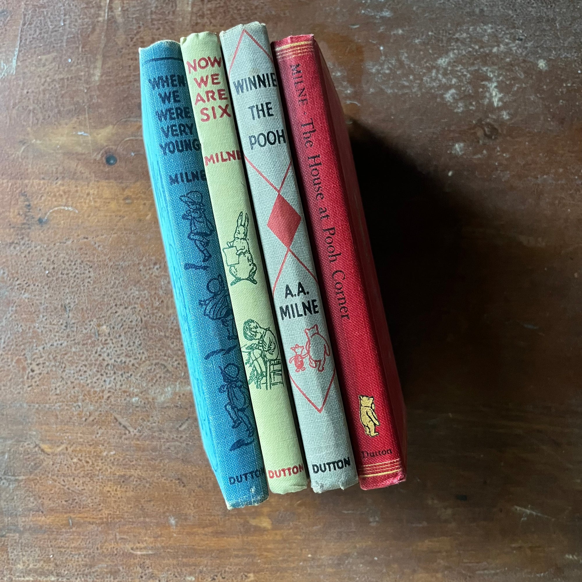 vintage children's storybooks, Winnie the Pooh, The House at Pooh Corner, When We Were Very Young & Now We are Six - Winnie the Pooh Four Book Set written by A. A. Milne with illustrations by Earnest H. Shepard - view of the spines