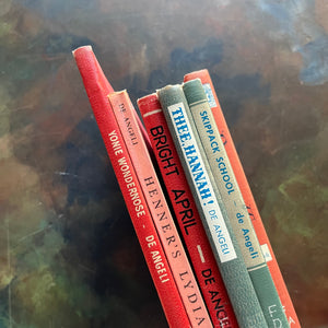 Yonie Wondernose-Henner's Lydia-Bright April-Thee, Hannah!-Skippack School-The Door in the Wall-written and illustrated by Marguerite de Angeli-Newbery Award Winner-ex-library bound editions-view of the spines