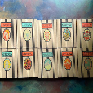  Young Folks Library Complete 10 Volume Book Set-anthology of children's literature-vintage children's stories-view of the front covers in orange, yellow and blue designs consistent throughout