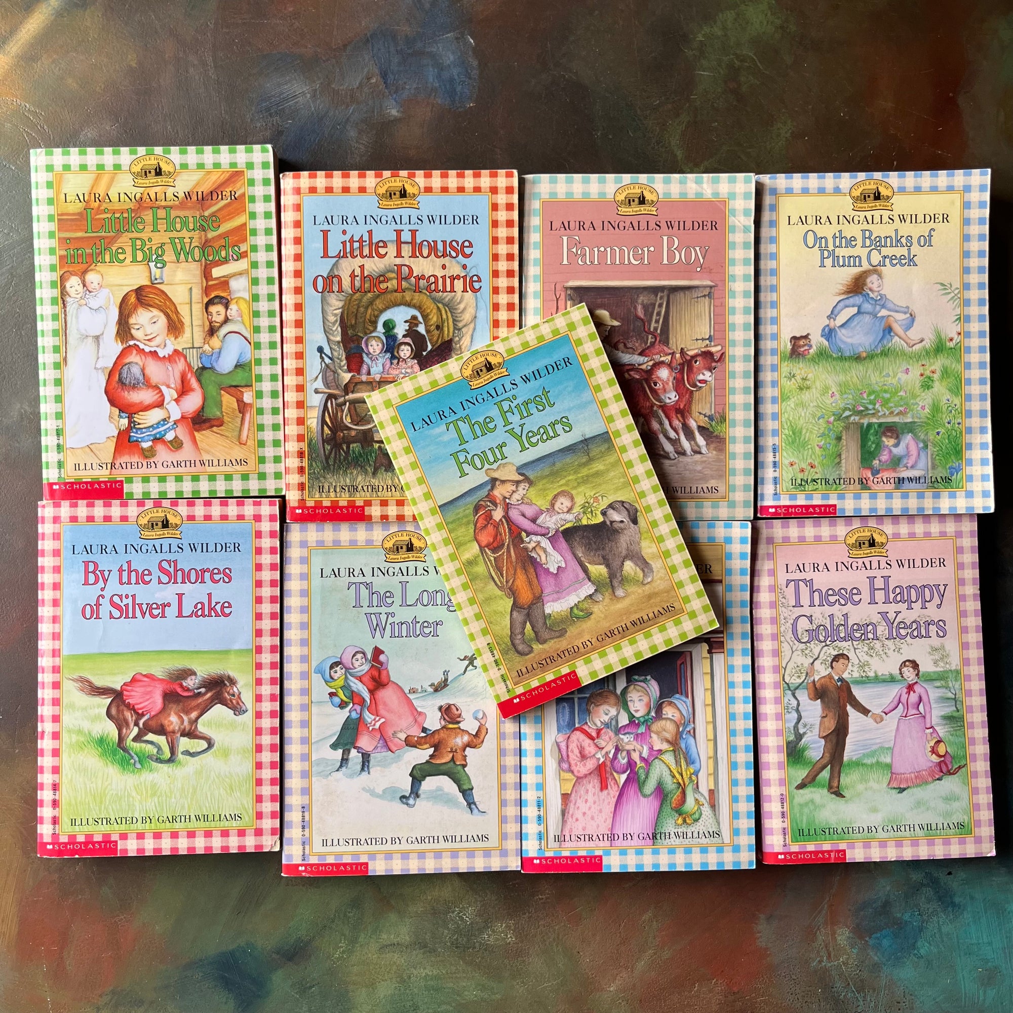 Log Cabin Vintage – vintage children’s book, children’s book, chapter book, scholastic books - Little House on the Prairie Complete Book Set written by Laura Ingalls Wilder with Illustrations by Garth Williams – view of the front covers