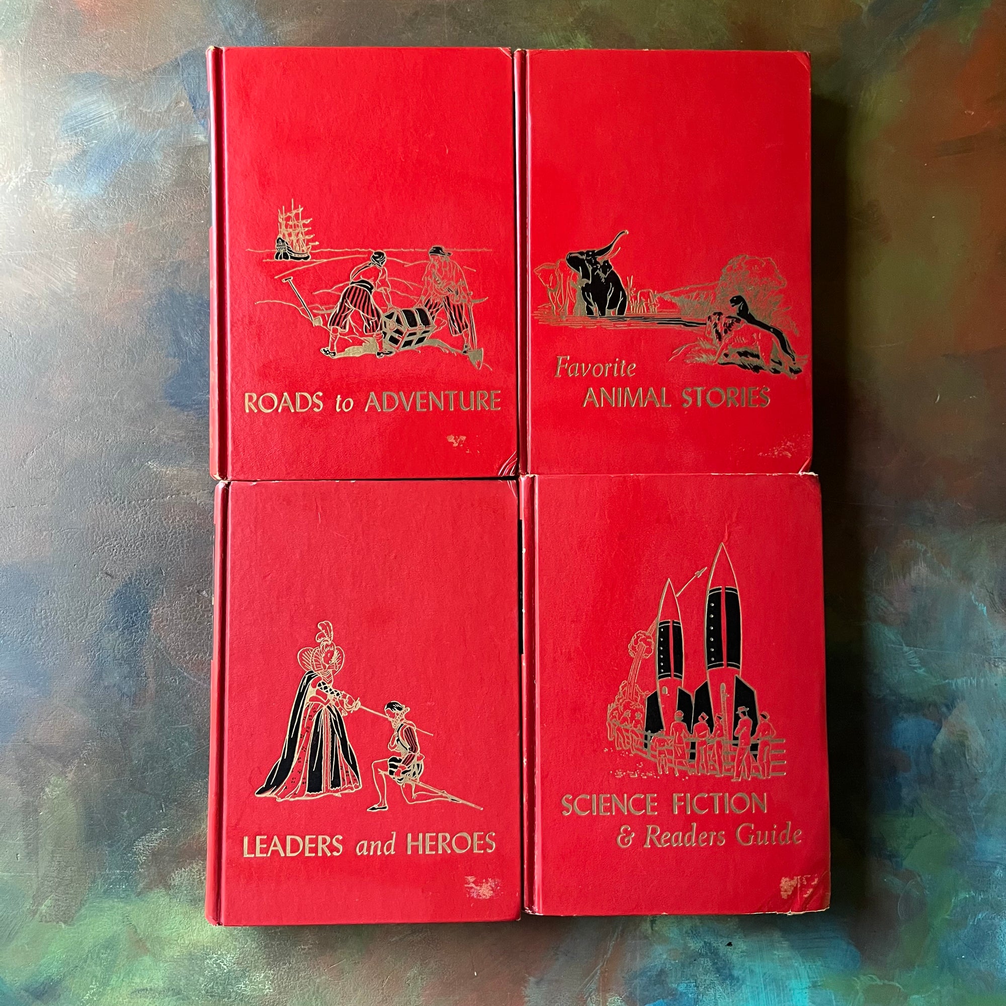 vintage children's storybook set-The Children's Hour Complete 16 Volume Book Set-spines-Sears, Roebuck and Company Exclusive-view of the front covers - note the damage in the bottom right-hand corners where stickers were removed