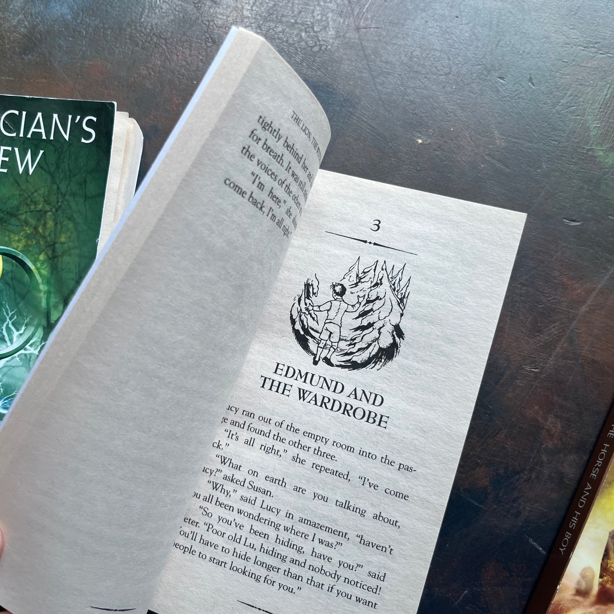 vintage children’s books-box set–The Chronicles of Narnia Complete Box Set written by C. S. Lewis-classic children's books that should be on every child's bookshelf - view of the chapter head showing an illustration