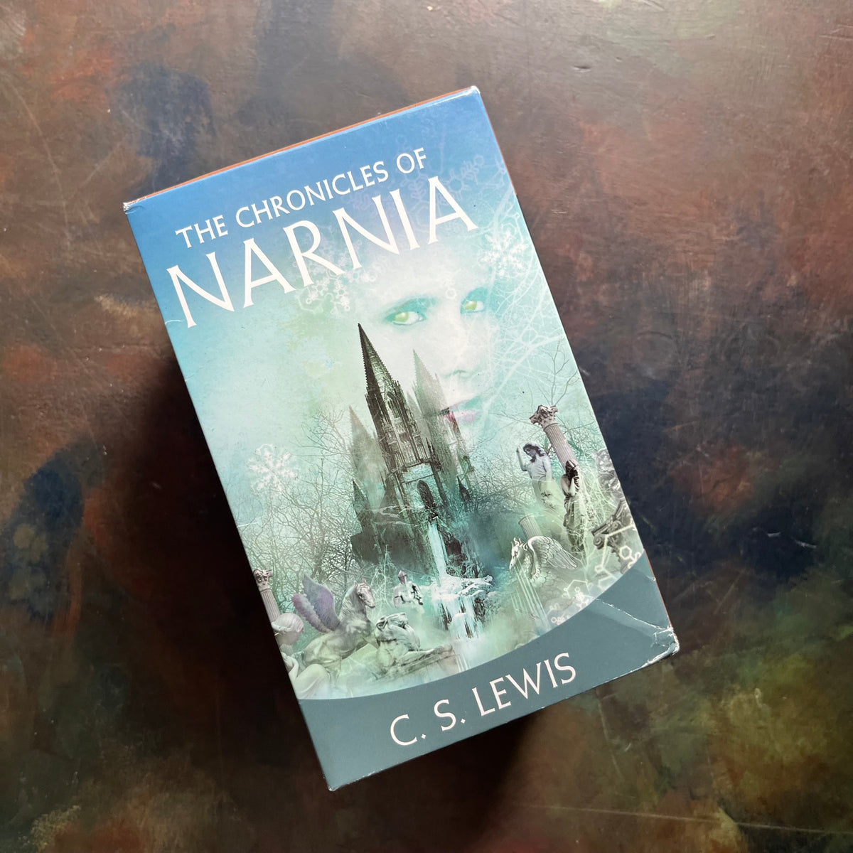 vintage children’s books-box set–The Chronicles of Narnia Complete Box Set written by C. S. Lewis-classic children's books that should be on every child's bookshelf - view of the side of the box