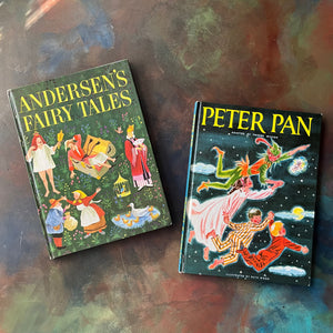 vintage children's picture books by Random House in oversized format:  Peter Pan written by J. M. Barrie and adapted by Phoebe Wilson with Illustrations by Ruth Wood & Andersen's Fairy Tales written by Hans Christian Andersen and Retold by Rose Dobbs with Illustrations by Gustav Hjortlund - view of the front covers