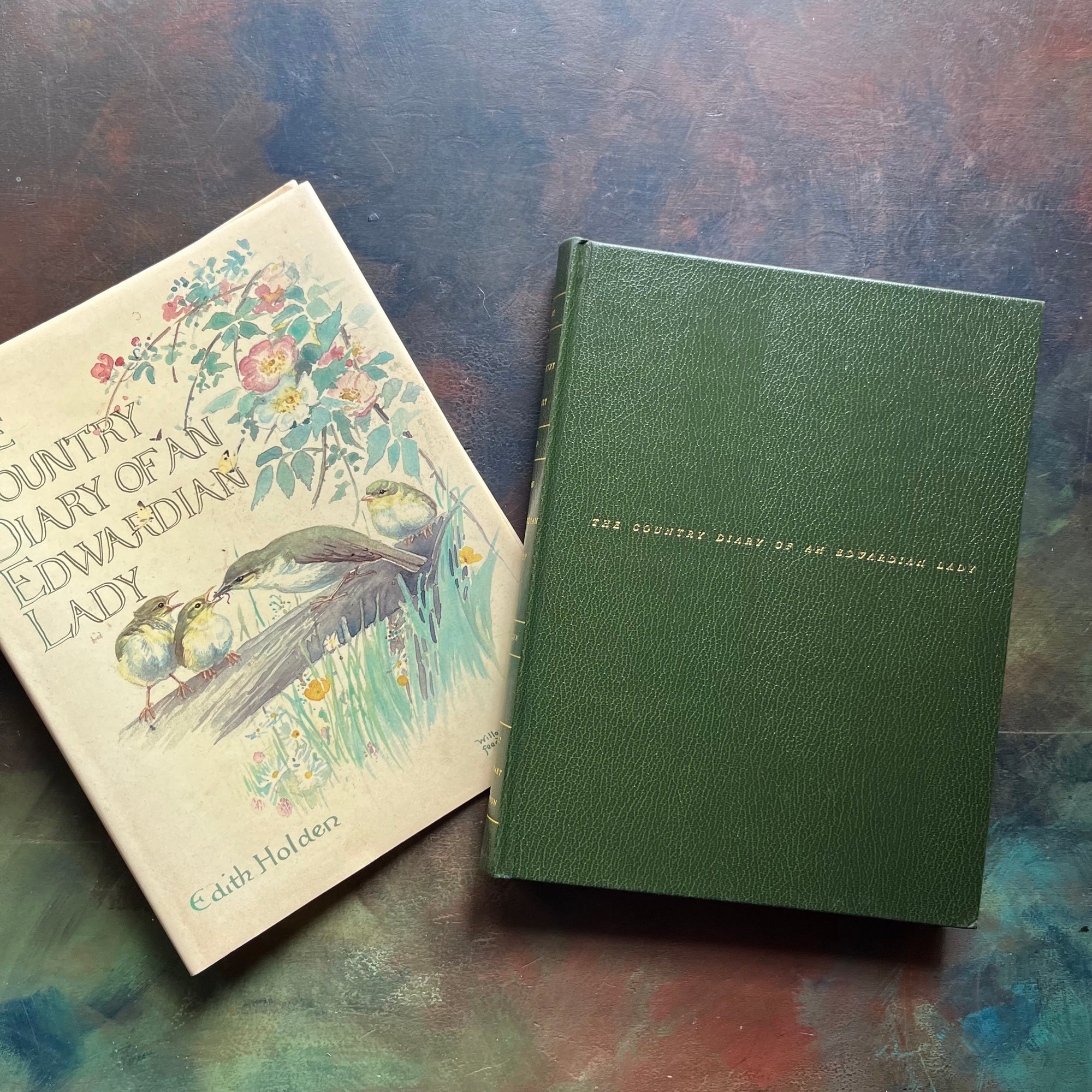 vintage nature sketchbook & diary - The Country Diary of An Edwardian Lady written & illustrated by Edith Holden-a yearlong nature study of the English Countryside from 1906-view of the front cover in dark green binding with the book title in gold leaf in the middle of the book cover