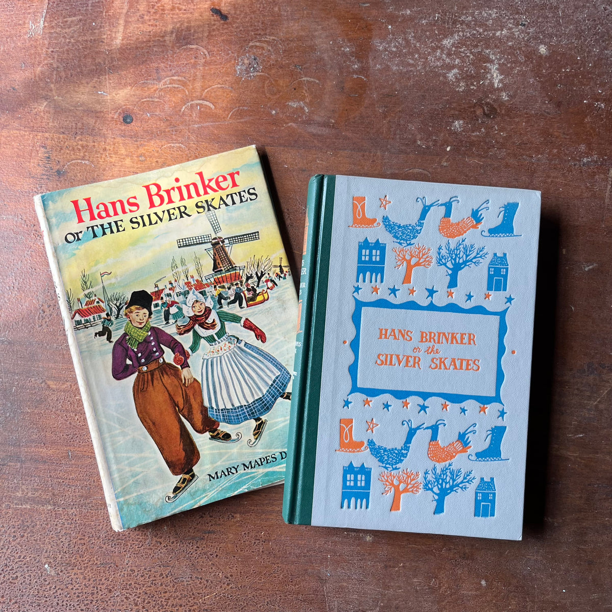 Log Cabin Vintage - vintage children's book, children's chapter book, Junior Deluxe Editions - Hans Brinker or the Silver Skates by Mary Mapes Dodge - view of the embossed front cover