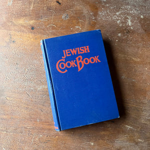 Log Cabin Vintage - vintage non-fiction, vintage cookbook, Jewish History - Jewish Cookbook by Mildred Grosberg Bellin - view of the bright blue front cover with red writing in a wonderful, vintage script