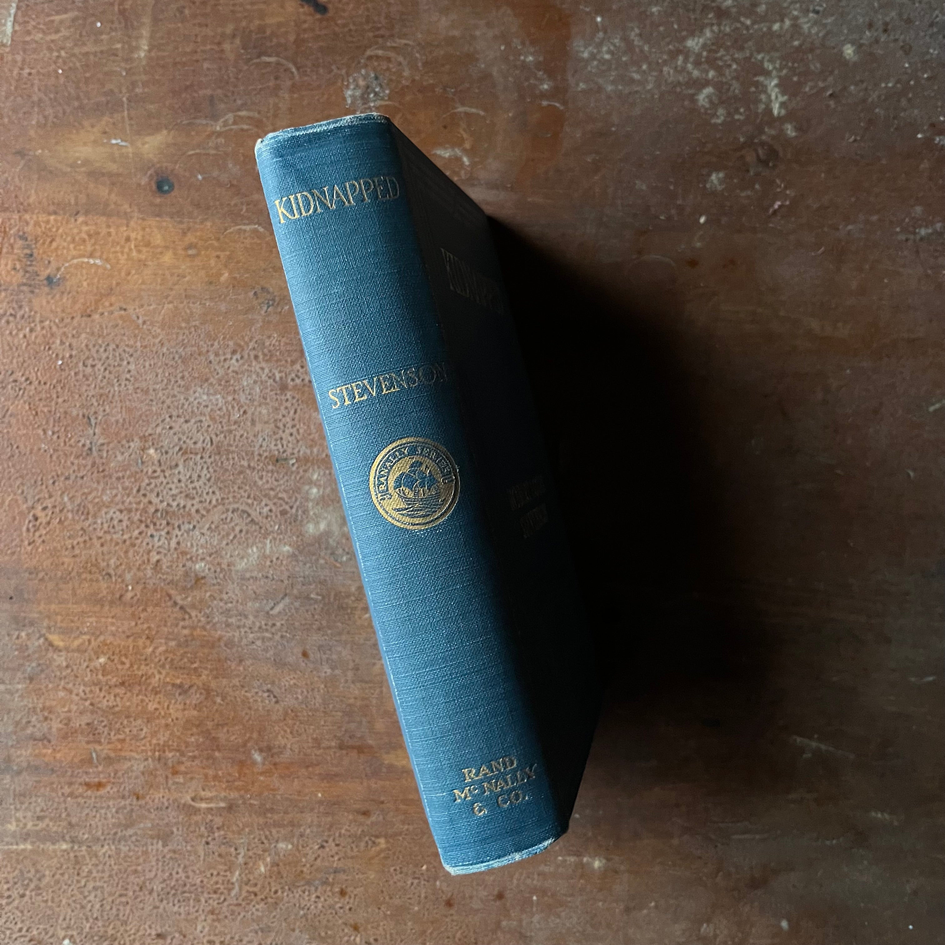 Log Cabin Vintage – vintage children’s book, children’s book, chapter book – Kidnapped by Robert Louis Stevenson with illustrations by Milo Winter - a 1916 Edition - view of the embossed spine