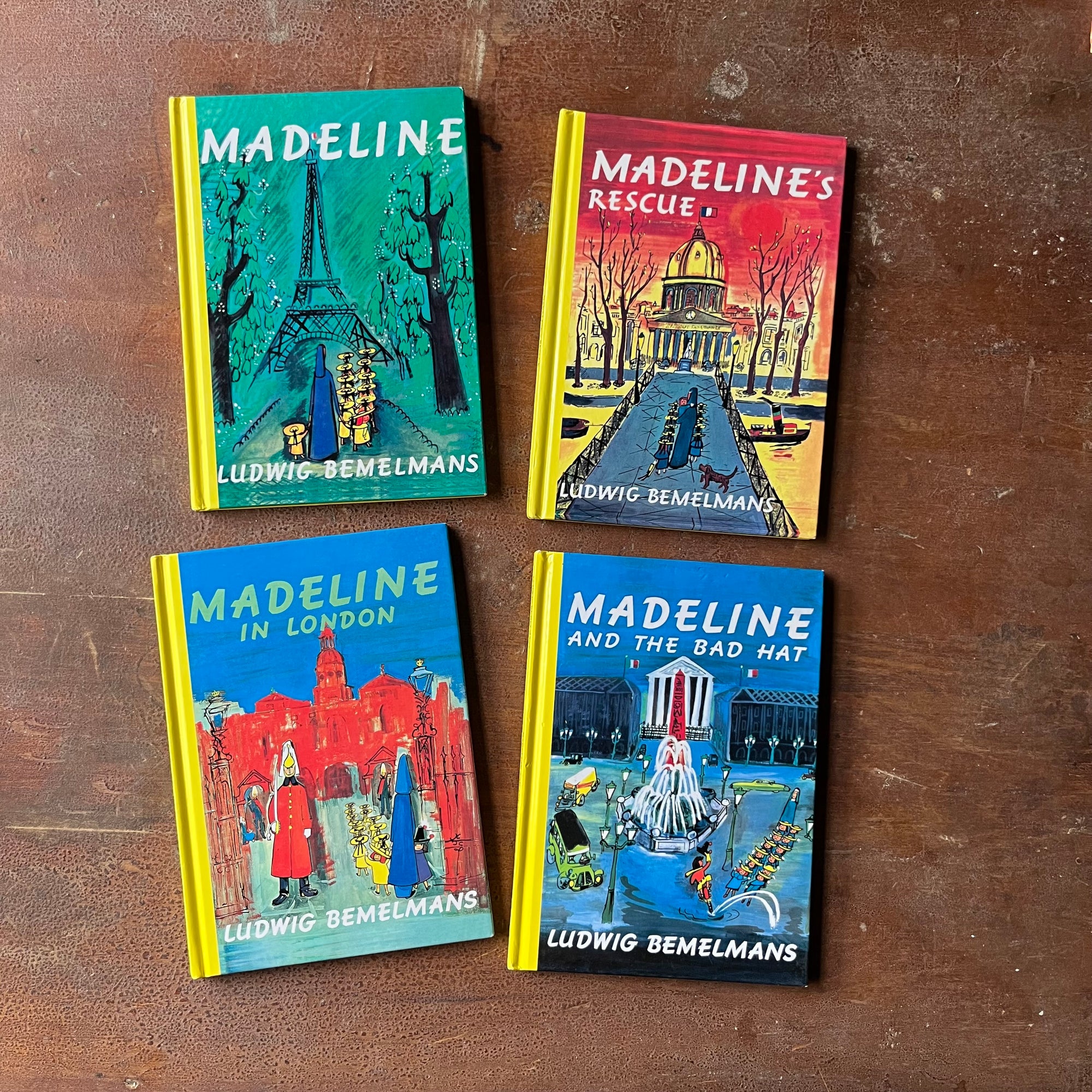 Log Cabin Vintage - children's books, vintage children's book, picture books - Madeline Four Book Set:  Madeline, Madeline's Rescue, Madeline in London & Madeline & The Bad Hat Stories and illustrations by Ludwig Bemelmans 1992 Hard Cover Editions - view of the front covers
