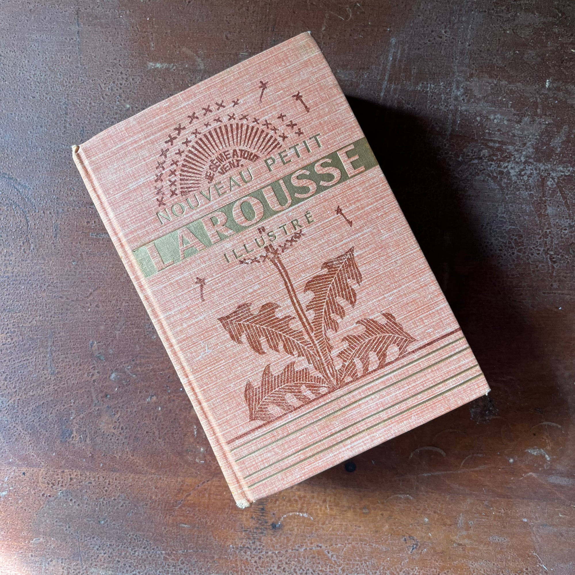 Nouveau Petit Larousse Illustre Dictionnaire Encyclopedique - 1955 Edition French Dictionary - view of the embossed front cover