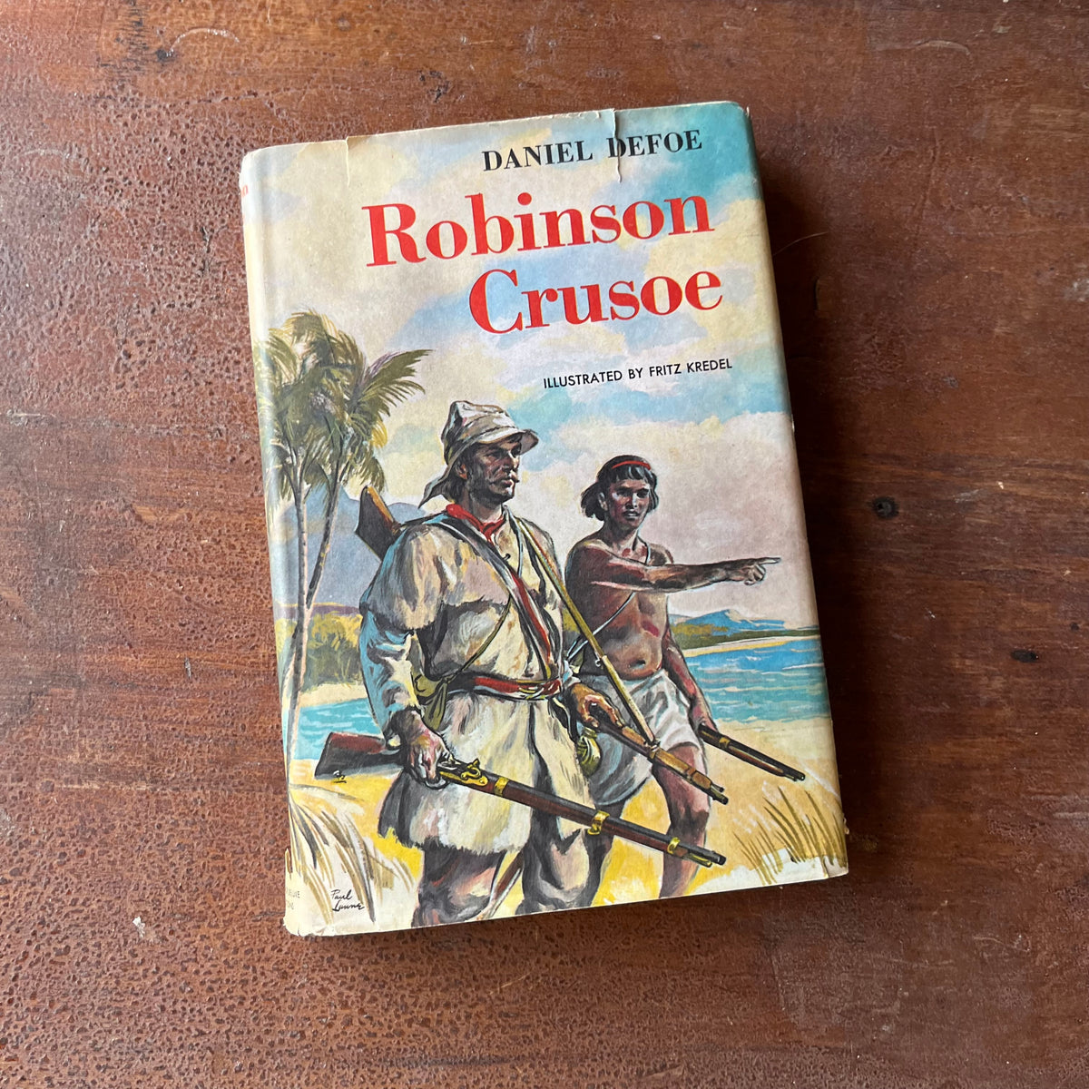 Log Cabin Vintage – vintage children’s book, children’s book, chapter books, Junior Deluxe Editions – Robinson Crusoe by Daniel DeFoe with illustrations by Fritz Kredel - view of the dust jacket's front cover