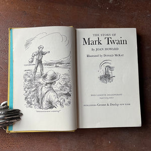 Log Cabin Vintage – vintage children’s book, children’s book, chapter book, living history book, history book, non-fiction, Signature Series - The Great Events in the Life of Mark Twain by Joan Howard with illustrations by Donald McKay - view of the title page and title page illustration depicting the illustration entitled Steeamm-boat a-coming