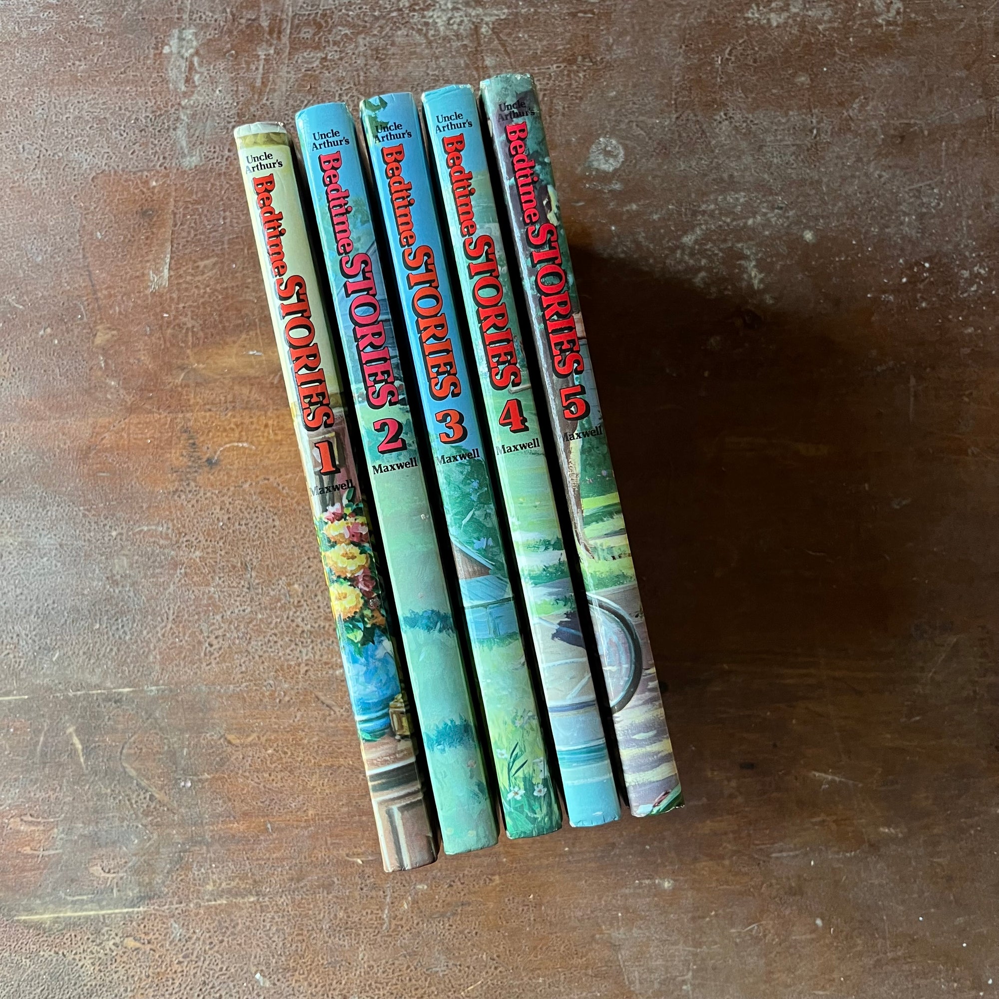 Log Cabin Vintage - vintage children's books, vintage religious books, vintage religious stories, Uncle Arthur - Uncle Arthur's Bedtime Stories Complete Set by Arthur S. Maxwell - view of their spines - also very colorful