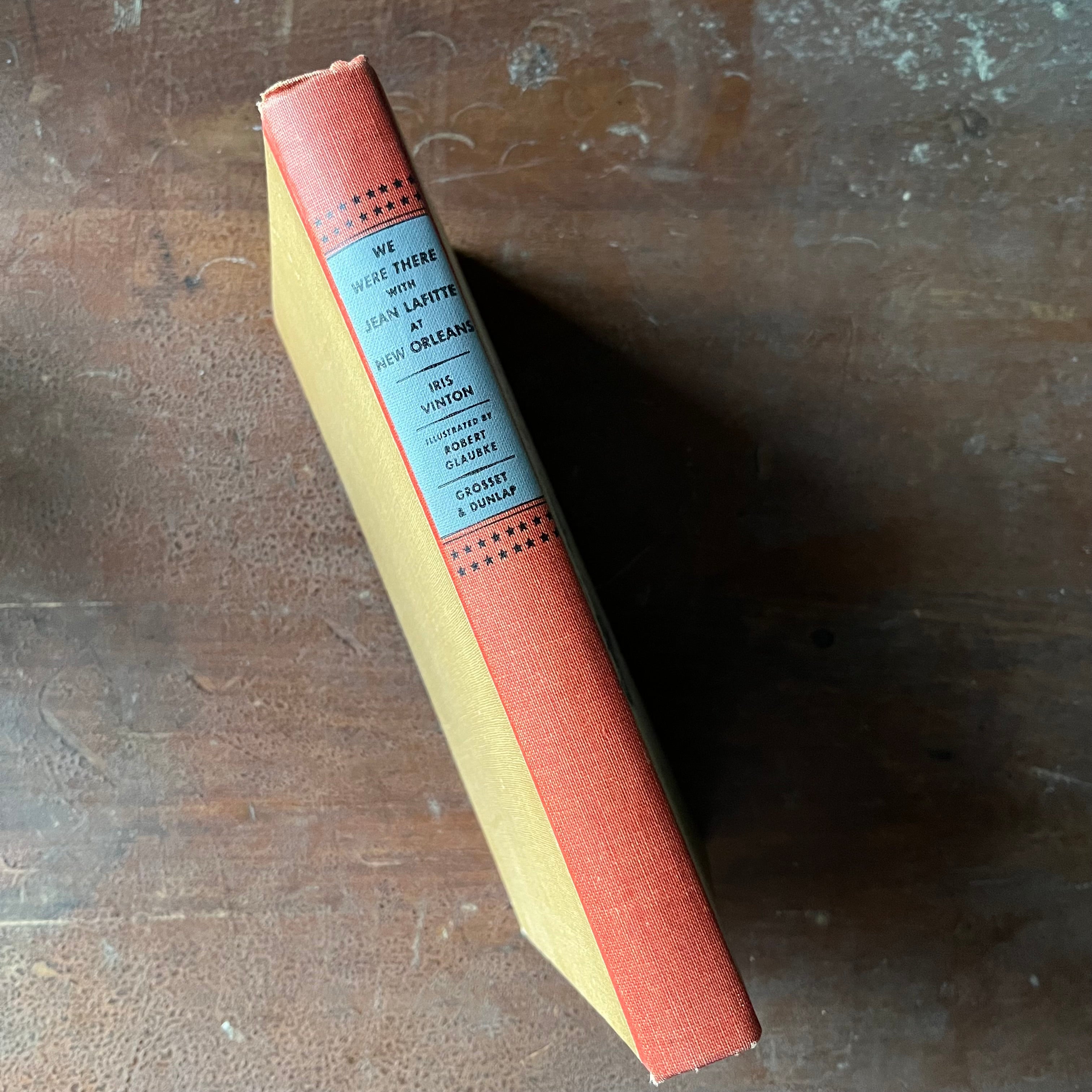 Log Cabin Vintage – vintage children’s book, children’s book, chapter book, history book – We Were There Series - We Were There with Jean Lafitte at New Orleans by Iris Vinton with illustrations by Robert Glaubke - view of the spine
