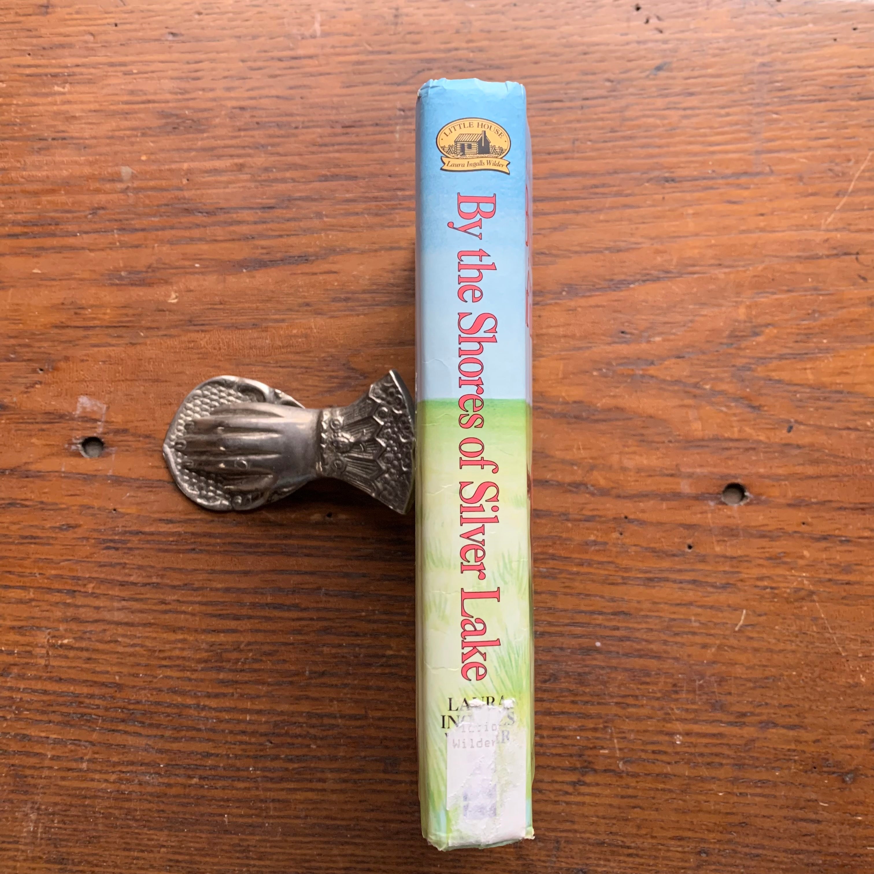 Log Cabin Vintage – vintage children’s book, children’s book, chapter book, Little House on the Prairie Series – By the Shores of Silver Lake by Laura Ingalls Wilder with Illustrations by Garth Williams - view of the dust jacket's spine